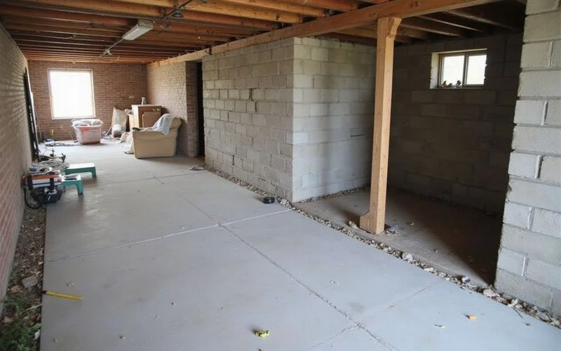 Carbon fiber straps applied to a stabilized basement wall